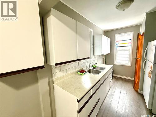1128 Garnet Street, Regina, SK - Indoor Photo Showing Kitchen With Double Sink