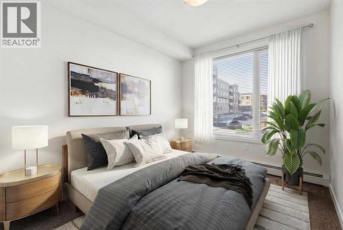 208, 30 Shawnee Common Sw, Calgary, AB - Indoor Photo Showing Bedroom