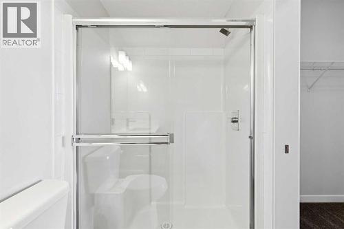 208, 30 Shawnee Common Sw, Calgary, AB - Indoor Photo Showing Bathroom