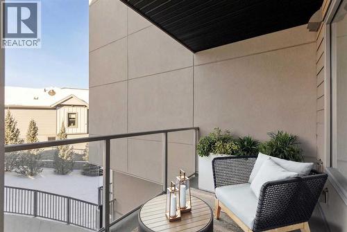 208, 30 Shawnee Common Sw, Calgary, AB - Outdoor With Exterior