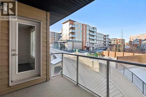 208, 30 Shawnee Common Sw, Calgary, AB - Outdoor With Exterior
