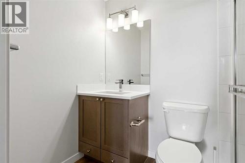 208, 30 Shawnee Common Sw, Calgary, AB - Indoor Photo Showing Bathroom