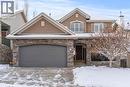 153 Crestridge Way Sw, Calgary, AB  - Outdoor With Facade 