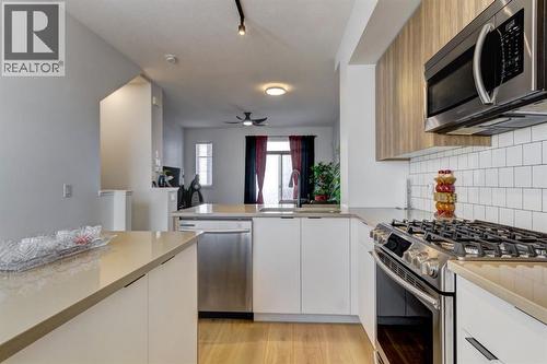 888 Walgrove Boulevard Se, Calgary, AB - Indoor Photo Showing Kitchen With Upgraded Kitchen