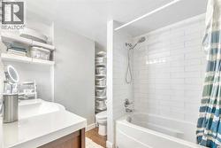 Main bathroom with built in shelving - 