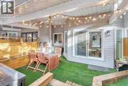 Oversized patio with low maintenance turf - 