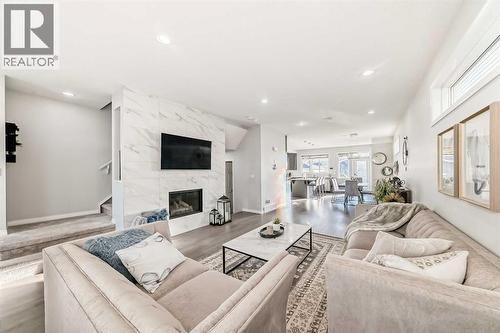 159 Evanscrest Park Nw, Calgary, AB - Indoor Photo Showing Living Room With Fireplace