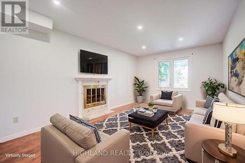 257 Huntington Ridge Drive, Mississauga, ON - Indoor Photo Showing Living Room With Fireplace