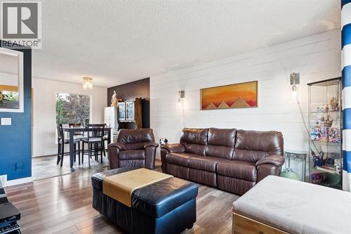 Living/Dining Room - 147 Falchurch Crescent Ne, Calgary, AB - Indoor Photo Showing Living Room