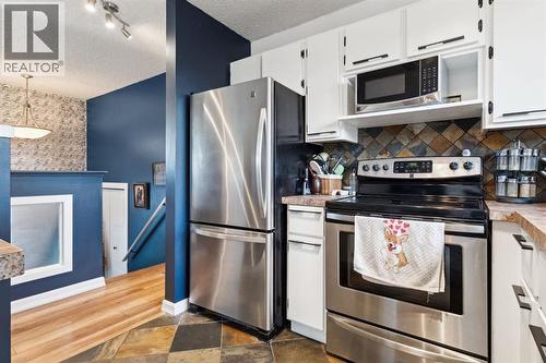 Kitchen - 147 Falchurch Crescent Ne, Calgary, AB - Indoor Photo Showing Kitchen