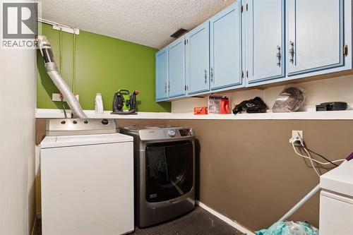 Laundry - 147 Falchurch Crescent Ne, Calgary, AB - Indoor Photo Showing Laundry Room