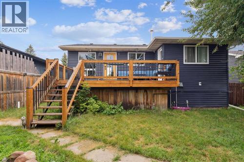 Backyard - 147 Falchurch Crescent Ne, Calgary, AB - Outdoor With Deck Patio Veranda