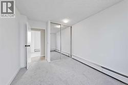 Primary bedroom with new paint and updated carpet - 