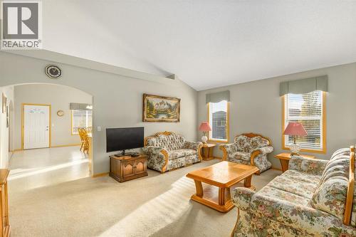 131 Panatella Close Nw, Calgary, AB - Indoor Photo Showing Living Room