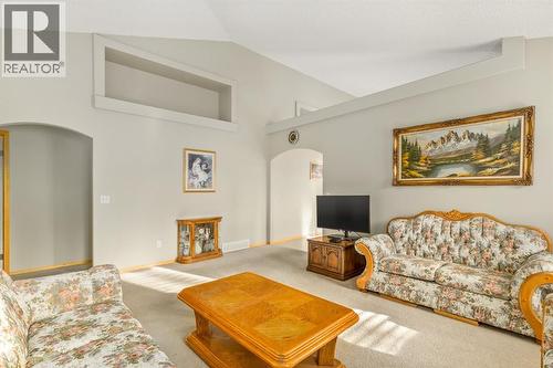 131 Panatella Close Nw, Calgary, AB - Indoor Photo Showing Living Room