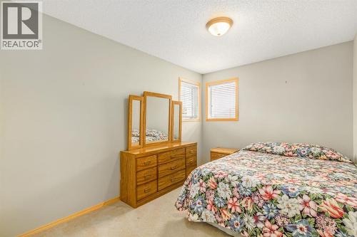 131 Panatella Close Nw, Calgary, AB - Indoor Photo Showing Bedroom