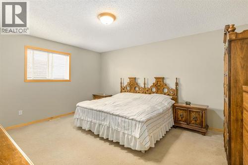 131 Panatella Close Nw, Calgary, AB - Indoor Photo Showing Bedroom