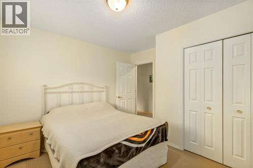 131 Panatella Close Nw, Calgary, AB - Indoor Photo Showing Bedroom