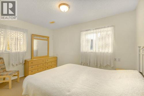 131 Panatella Close Nw, Calgary, AB - Indoor Photo Showing Bedroom