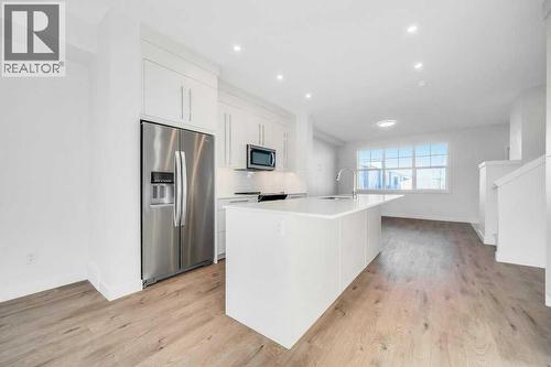 293 Dawson Way, Chestermere, AB - Indoor Photo Showing Kitchen With Upgraded Kitchen