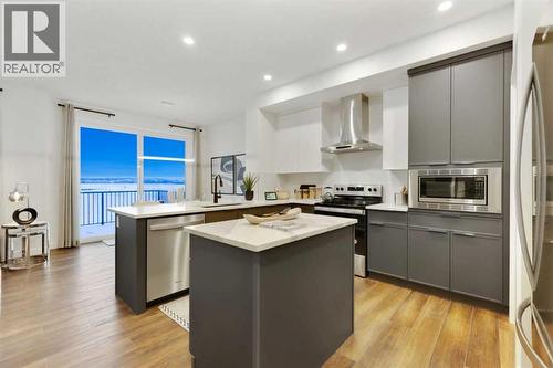 206 Sora Way Se, Calgary, AB - Indoor Photo Showing Kitchen With Stainless Steel Kitchen With Upgraded Kitchen