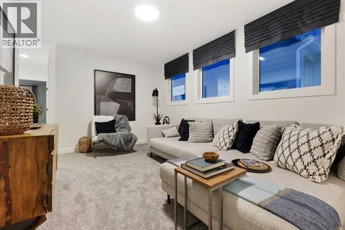 206 Sora Way Se, Calgary, AB - Indoor Photo Showing Living Room
