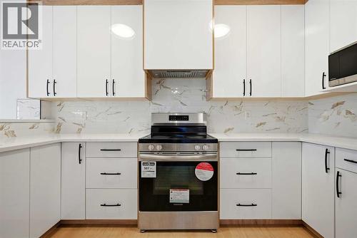81 Saddlemont Road Ne, Calgary, AB - Indoor Photo Showing Kitchen