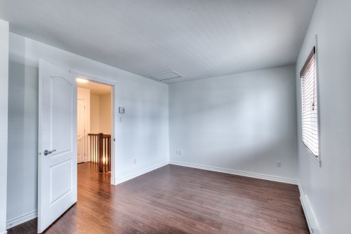 Chambre à coucher principale - 434 Rue Étienne-Lavoie, Laval (Sainte-Dorothée), QC - Indoor Photo Showing Other Room