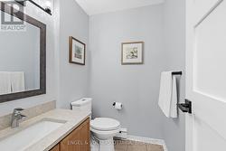 A two piece bathroom on the second level - 