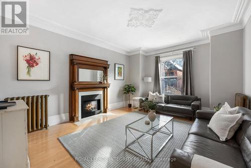 Beautiful living room with gas fireplace! - 553 Gilmour Street, Ottawa, ON - Indoor Photo Showing Living Room With Fireplace