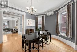 Grand dining room with large windows. - 