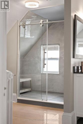 Large walk-in shower with glass doors. - 553 Gilmour Street, Ottawa, ON - Indoor Photo Showing Other Room