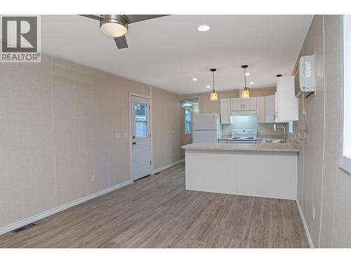 Mobile home new flooring - 1421 Erickson Road Unit# 21, Creston, BC 