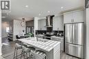 592 Buffaloberry Manor Se, Calgary, AB  - Indoor Photo Showing Kitchen With Stainless Steel Kitchen 