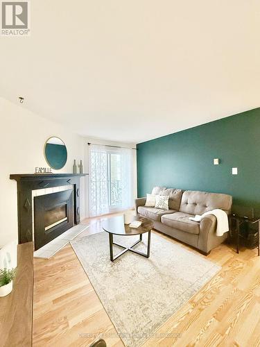 217 - 737 Deveron Crescent, London South (South T), ON - Indoor Photo Showing Living Room With Fireplace
