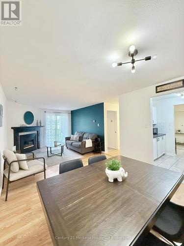 217 - 737 Deveron Crescent, London South (South T), ON - Indoor Photo Showing Living Room With Fireplace