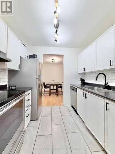 217 - 737 Deveron Crescent, London South (South T), ON - Indoor Photo Showing Kitchen With Double Sink