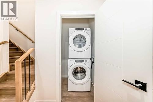 Unit 201B - 1729 31 Street Sw, Calgary, AB - Indoor Photo Showing Laundry Room