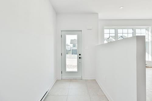 Hall d'entrée/Vestibule - 37 Rue Du Noroît, Lanoraie, QC 