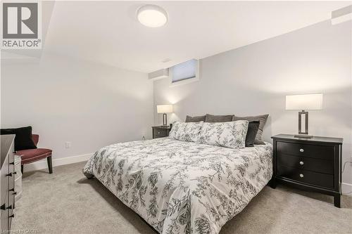 Bedroom featuring light colored carpet - 697 Lambshead Drive, Burlington, ON - Indoor Photo Showing Bedroom