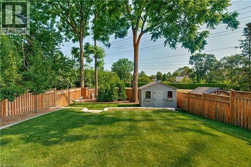 Fenced backyard with a shed - 697 Lambshead Drive, Burlington, ON - Outdoor