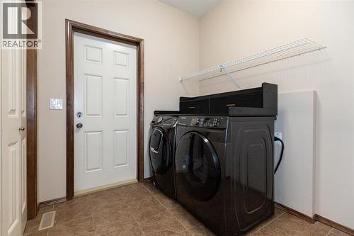 4828 55 Boulevard Close, Innisfail, AB - Indoor Photo Showing Laundry Room