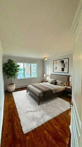 Chambre à coucher principale - 5-9300 Rue Rubaniers, Brossard, QC - Indoor Photo Showing Bedroom
