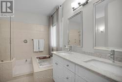 Main Floor: Primary 5-Piece Ensuite - 