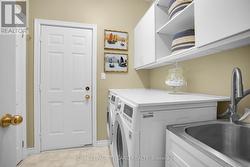 Main Floor: Entrance from Garage and Laundry Room - 