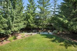 Backyard: Landscaped/Low Maintenance - 