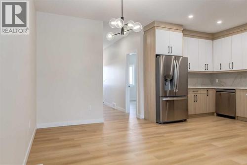 1981 Mccaskill Drive, Crossfield, AB - Indoor Photo Showing Kitchen With Stainless Steel Kitchen