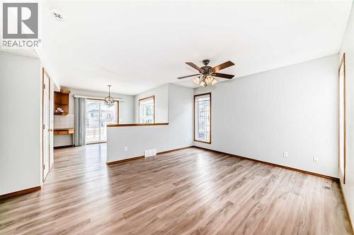 Newer flooring flows throughout the main level - 21 Hillview Road, Strathmore, AB - Indoor Photo Showing Other Room