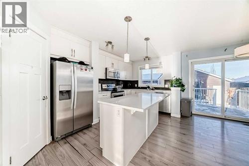 366 Auburn Bay Avenue Se, Calgary, AB - Indoor Photo Showing Kitchen With Upgraded Kitchen