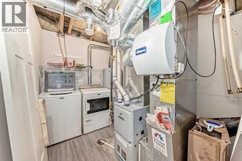 366 Auburn Bay Avenue Se, Calgary, AB - Indoor Photo Showing Laundry Room